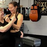 Elder Stella Erasmus-Johnson and Ivy Richardson pose together at the promoting resiliency through physical activity taping