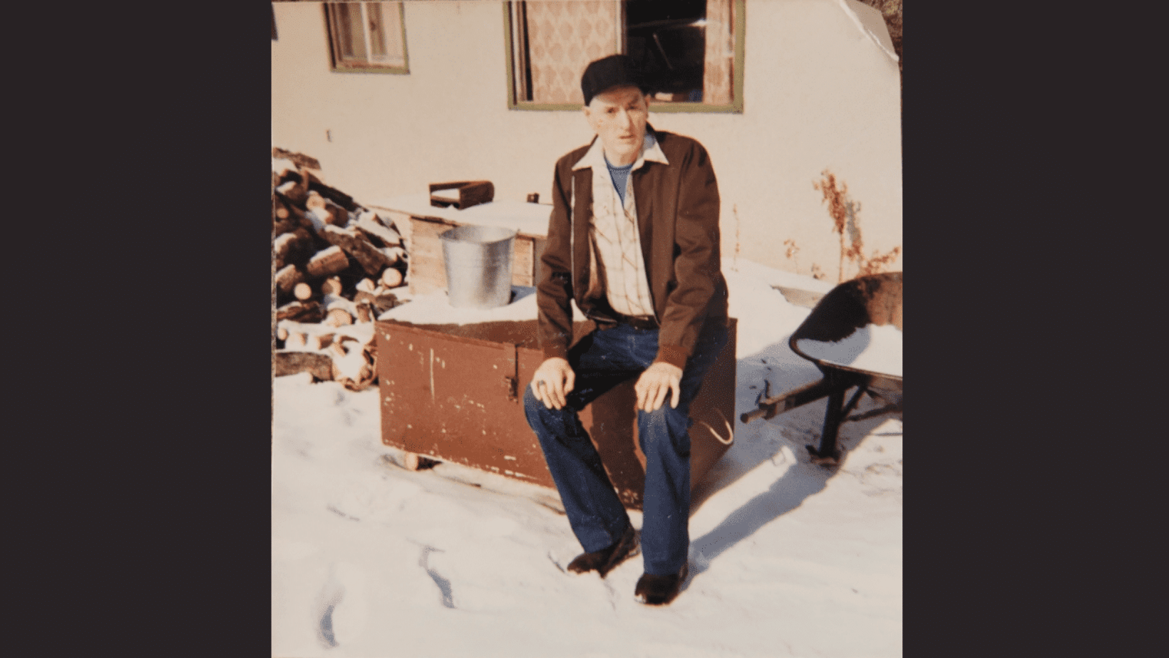Cree Elder Alphonse Little Poplar sits on a bench outside his home on the Sweetgrass First Nation in an undated photo..