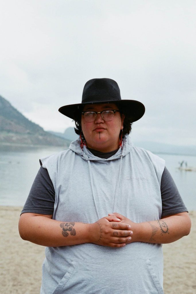 Madeline Terbasket, a Two-Spirit performing artist, pictured in syilx homelands in Penticton, B.C., on June 13. Photo by Aaron Hemens