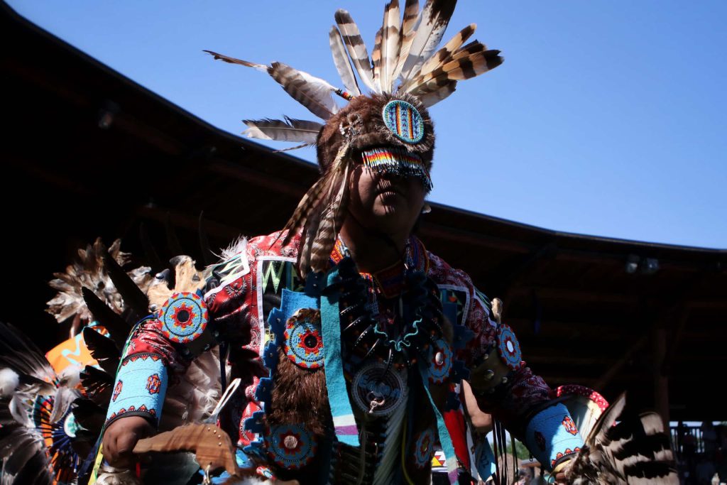 A dancer participates in the grand entry of the second day of the 41st Kamloopa Powwow in Tk’emlúps (Kamloops) in Secwépemc homelands on July 30. Photo by Aaron Hemens