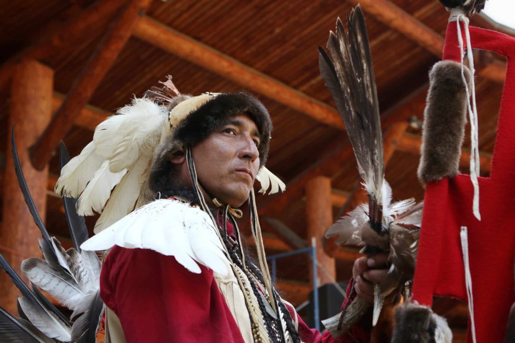 Greg Ferguson of Tk’emlúps te Secwe̓pemc First Nation gives a nod of recognition prior to the start of the grand entry of the second day of the 41st Kamloopa Powwow in Tk’emlúps (Kamloops) in Secwépemc homelands on July 30. Photo by Aaron Hemens