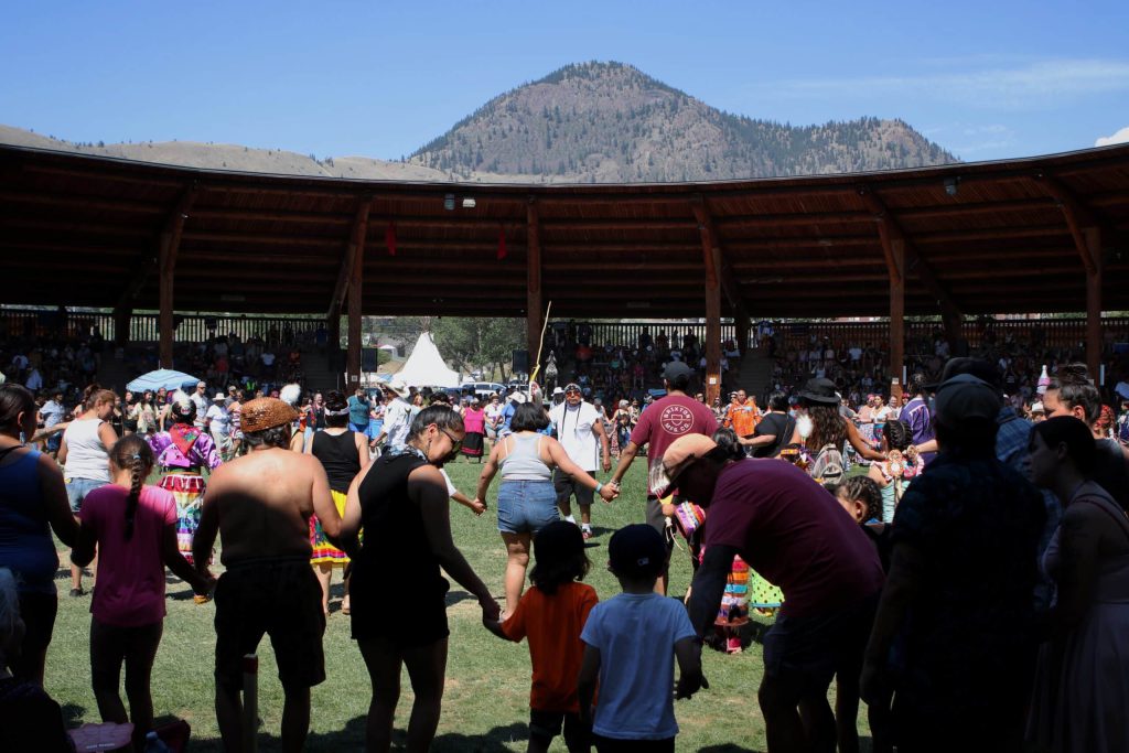 People fill the arbour during a Two-Spirit round dance at the 41st Kamloopa Powwow in Tk’emlúps (Kamloops) in Secwépemc homelands on July 30. Photo by Aaron Hemens