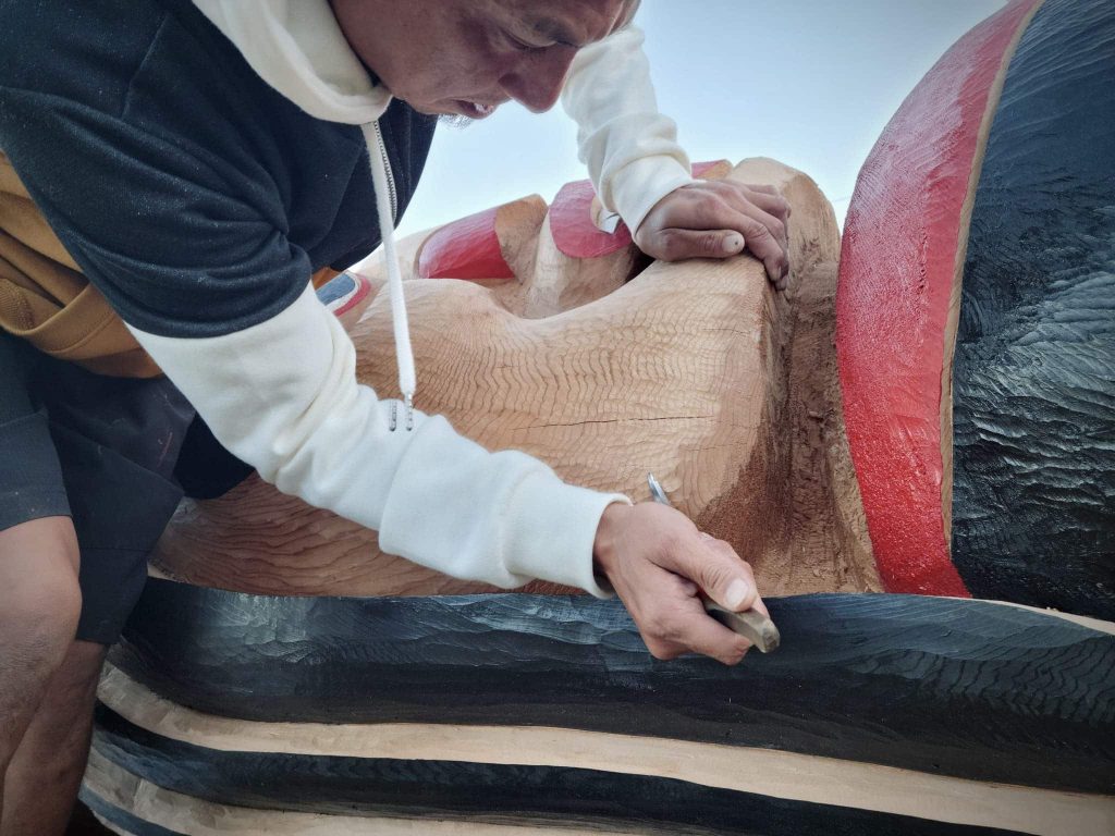 Carver working with his grandfather's 100 year old knife
