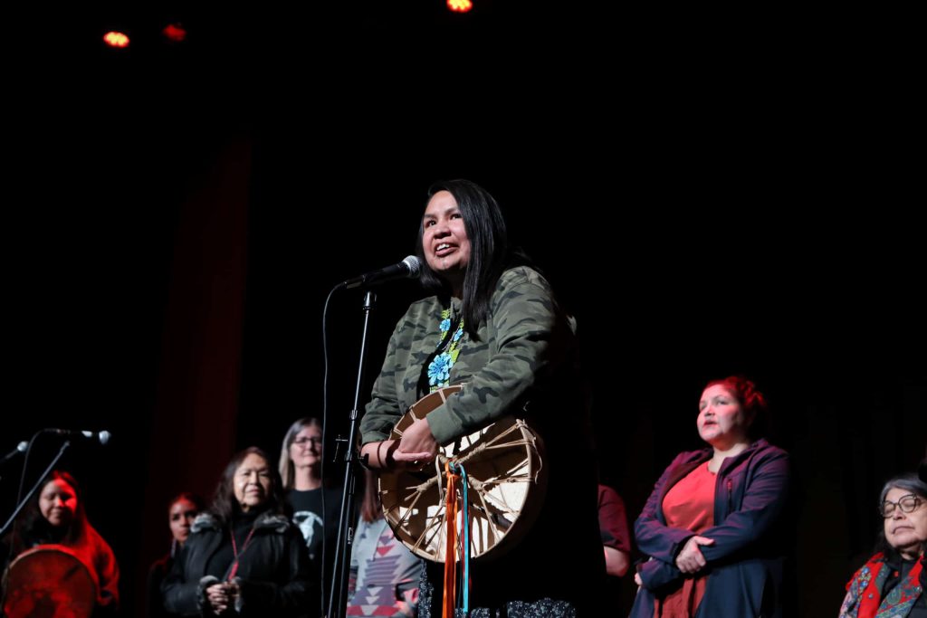Secwépemc Hereditary Matriarch Miranda Dick addresses the crowd during a fundraiser in “Vancouver” on Jan. 19 for eight Indigenous and non-Indigenous land defenders facing jail time for opposing the Trans Mountain pipeline expansion project (TMX). Photo by Aaron Hemens