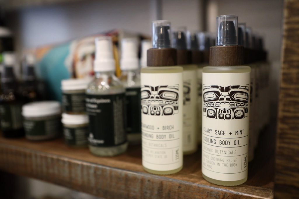 Body oils and other self-care products line the shelf at Fireweeds Boutique. Photo by Aaron Hemens
