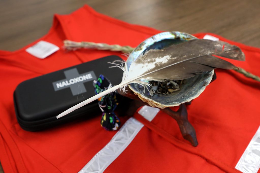 In addition to harm-reduction supplies, frontline workers with knknxtəwix̌’s Indigenous Harm Reduction Team (IHRT) patrol the streets of downtown kiʔlawnaʔ (Kelowna) twice a day with an eagle feather, sage and smudge bowls, medicine ties and other cultural elements. Photo by Aaron Hemens