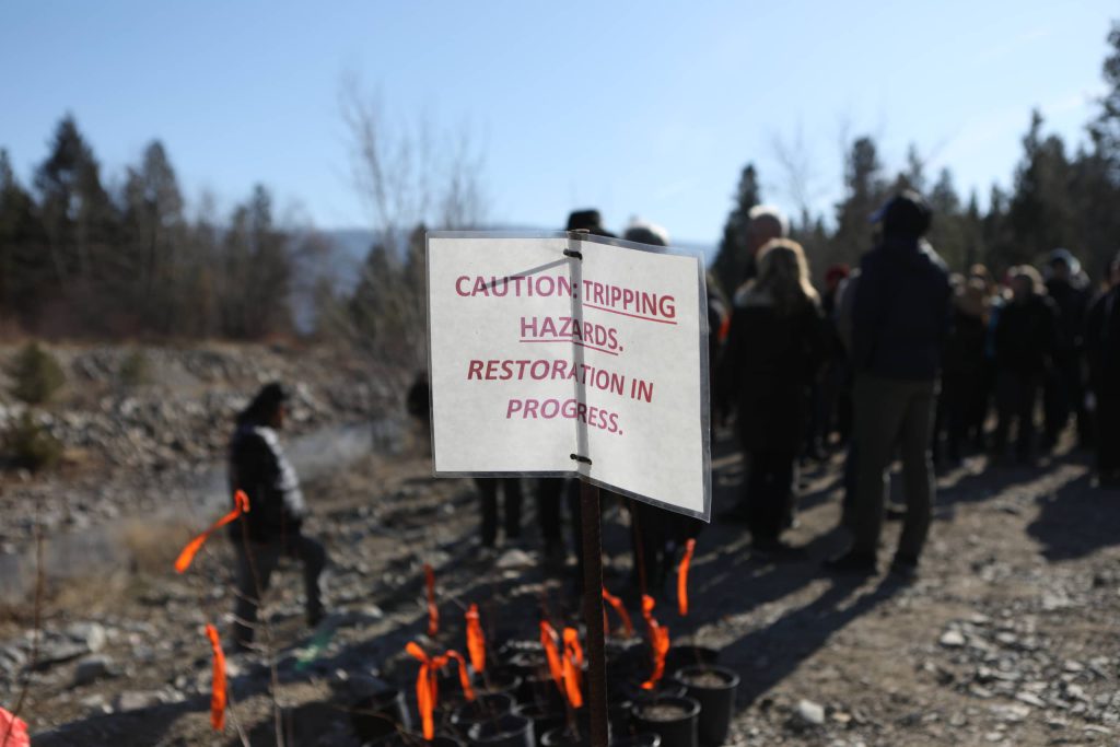 A sign marking the nluxʷluxʷɬcwix (Trout Creek) restoration site in the district of “Summerland” in syilx homelands on March 22. Photo by Aaron Hemens