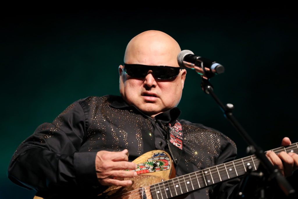 Leroy Joe of Indigenous musical group The Spiritual Warriors performs at the 2023 skəlɣap Movable Feast show in snpintktn (Penticton) in syilx homelands on March 29. Photo by Aaron Hemens