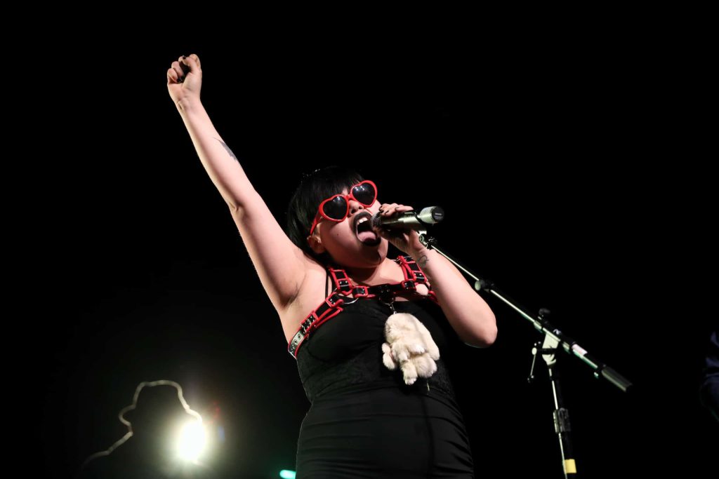 Daisy Joe of Indigenous musical group The Spiritual Warriors performs at the 2023 skəlɣap Movable Feast show in snpintktn (Penticton) in syilx homelands on March 29. Photo by Aaron Hemens