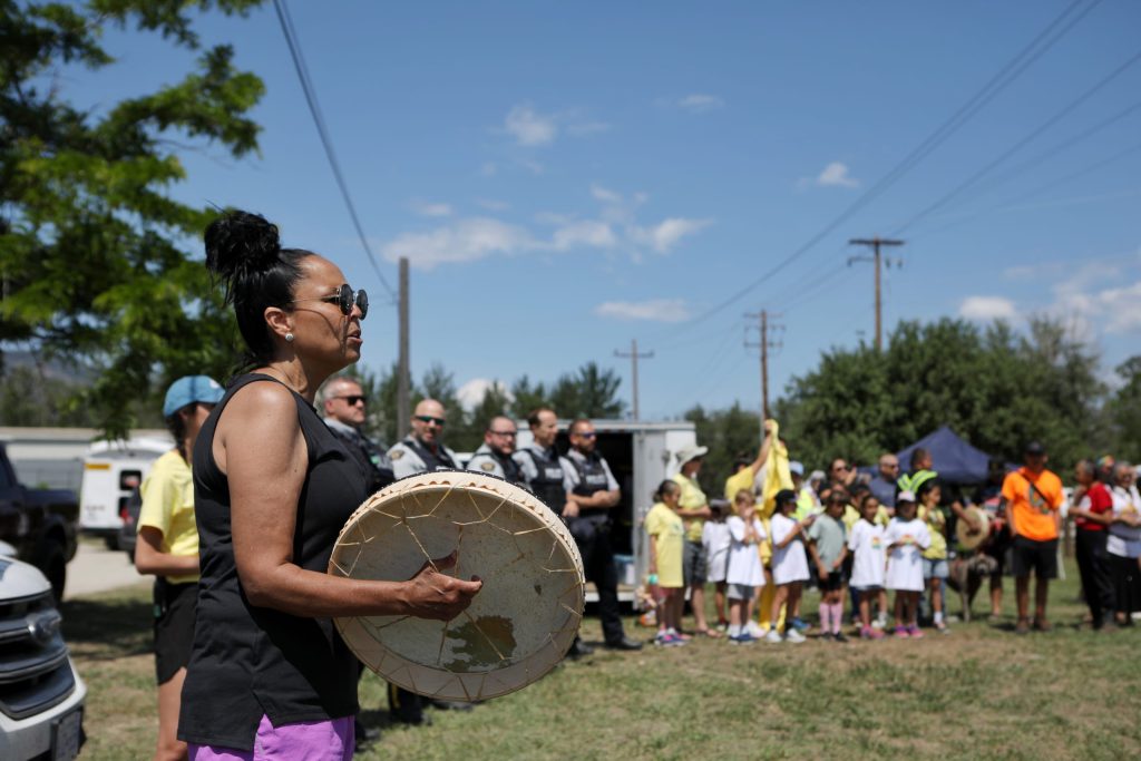 nkwancinəm Kim Montgomery drums at the starting point of this year’s Spirit of Syilx Unity Run on June 1, at the Syilx Nation Indian Residential School Monument in snpintktn (Penticton). Photo by Aaron Hemens