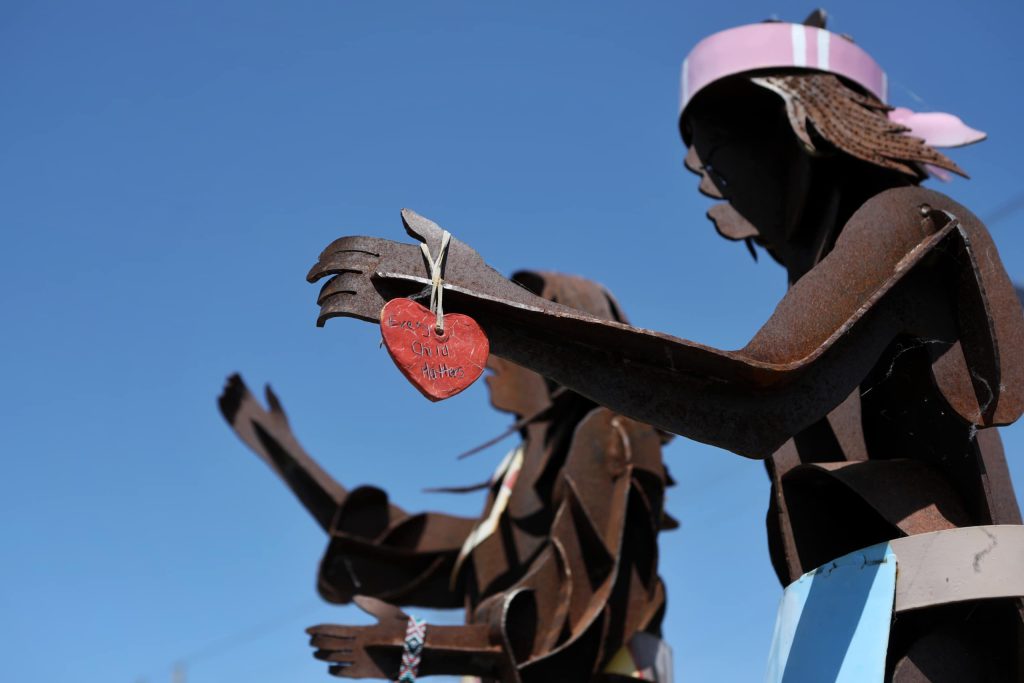 An Every Child Matters symbol is tied to the Syilx Nation Indian Residential School Monument in snpintktn (Penticton) on June 1. Photo by Aaron Hemens