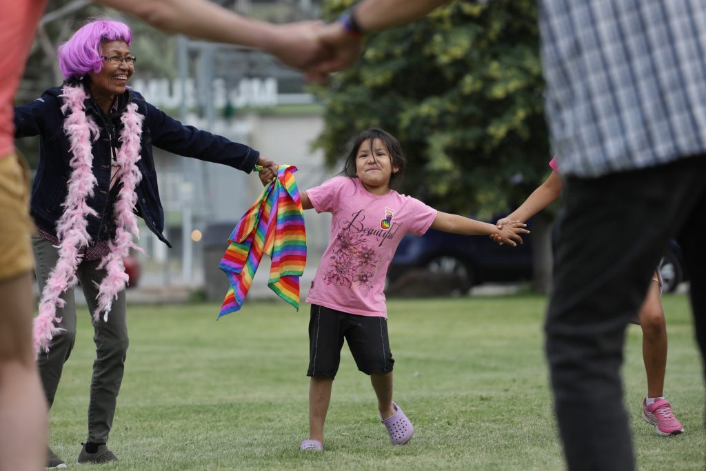 LSIB Youth Serenity Marsden, centre, participates in a round dance during the Lower Similkameen Indian Band’s (LSIB) third annual Pride carnival in niʔxʷinaʔ (Keremeos) on June 16. Photo by Aaron Hemens