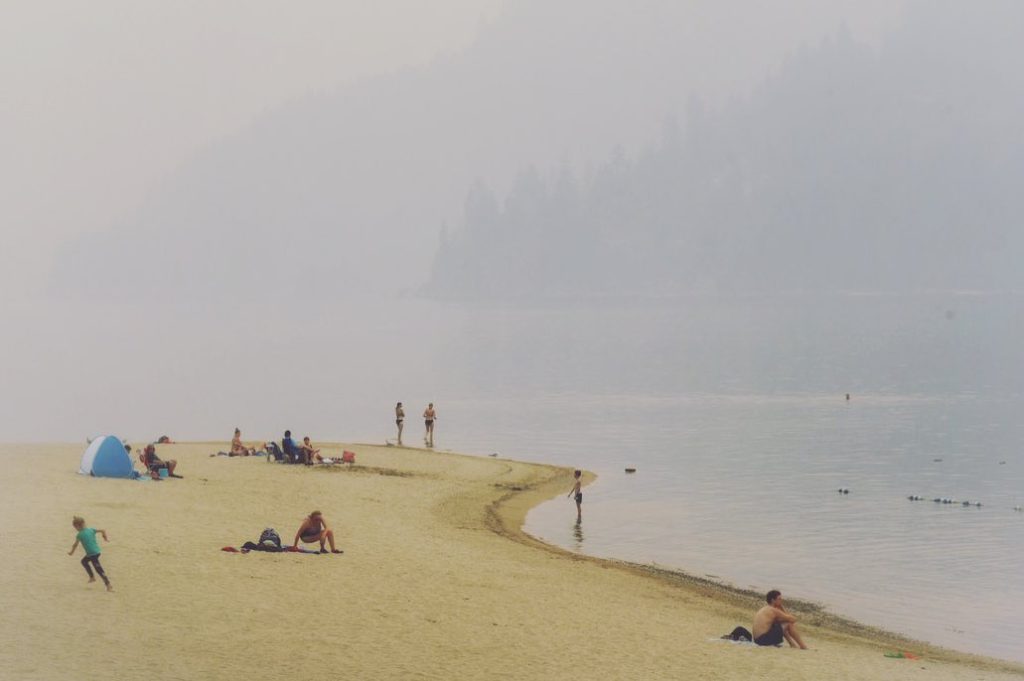 The wildfire smoke makes it difficult to see across the Kootenay River from Lakside Park in ki’yamələp place of dead trees (Nelson, B.C.), Sinixt homelands. July 2021. Photo by Mike Graeme