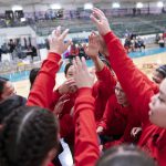 The All My Relations Basketball team chants “East Van” after warm up heading into the first quarter of play. Photo by Paige Taylor White