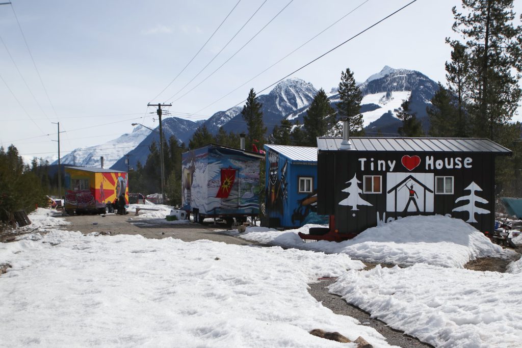 The Tiny House Warriors Village in “Blue River” in Secwepemcúl’ecw, pictured in 2022. Adjacent to the village was a temporary camp for Trans Mountain pipeline expansion (TMX) workers. Photo by Aaron Hemens