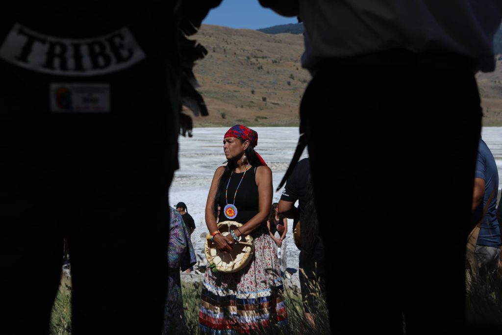 nkʷancinəm Kim Montgomery pictured near kłlilx’w (Spotted Lake) during the opening ceremony of the nation’s annual general assembly and Youth leadership summit in sw̓iw̓s (Osoyoos) in syilx Okangan homelands on July 24. Photo by Aaron Hemens