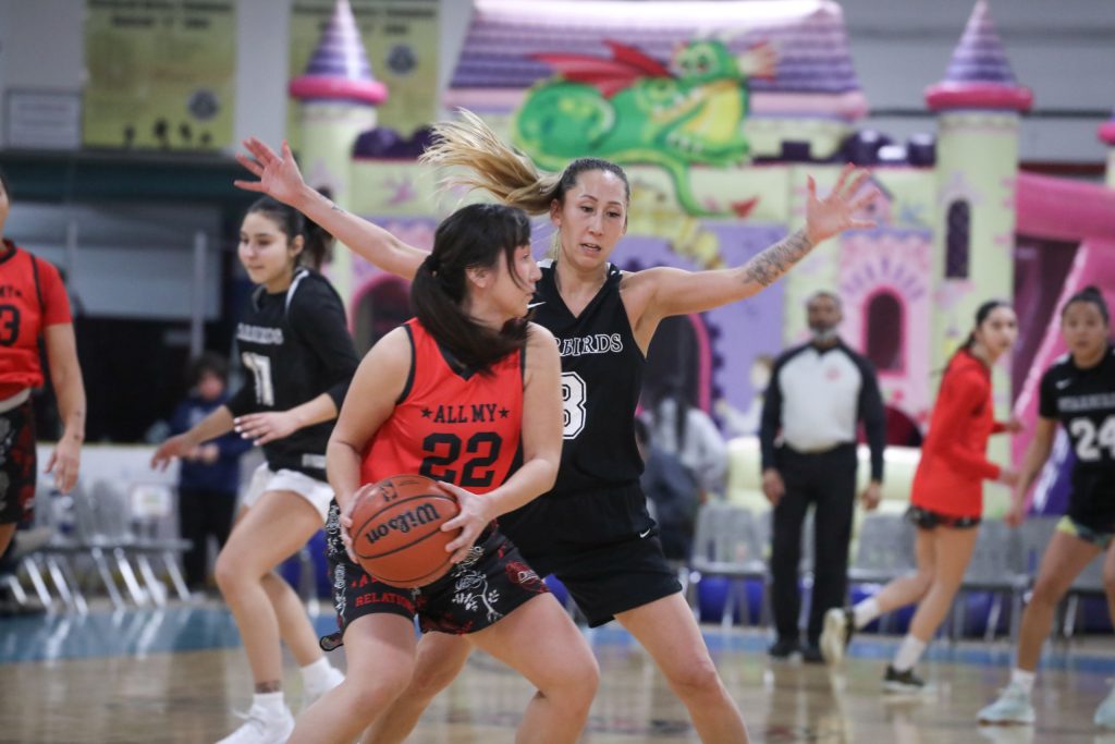 Similkameen Starbirds' guard Nicola Terbasket plays pressure defence against Vancouver All My Relations' player Julissa Azak during their game on Feb. 13, for the 65th annual All Native Basketball Tournament. Photo by Aaron Hemens