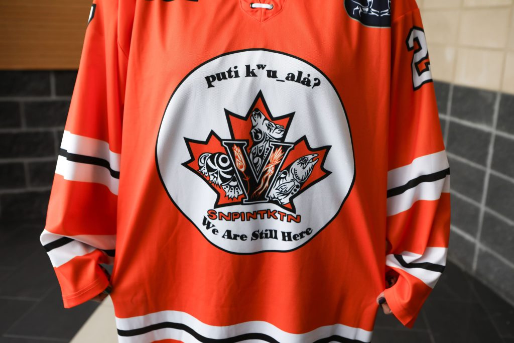 Wynona Paul, a syilx Okanagan multidisciplinary artist from the Penticton Indian Band, wears a Penticton Vees jersey that she designed for the team’s Indigenous Night on Jan. 31. Photo by Aaron Hemens