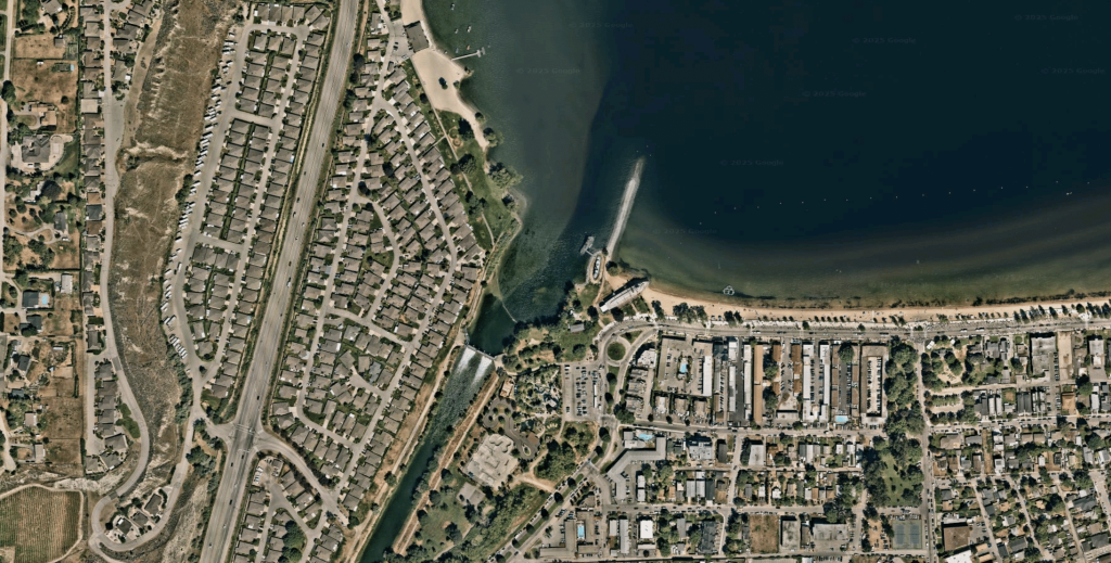 A satellite view of the Penticton-Okanagan Lake Dam in snpink’tn (Penticton), between sq'awsitkʷ (Okanagan River) and kɬúsx̌nítkʷ (Okanagan Lake). Photo courtesy Google Maps