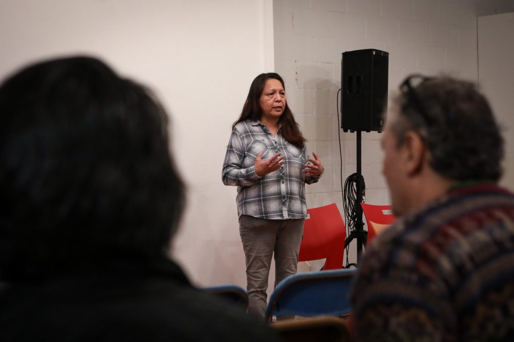 April Thomas of the Secwépemc Nation speaks to supporters during the fundraising event in 'Vancouver' on Feb. 7. Photo by Aaron Hemens