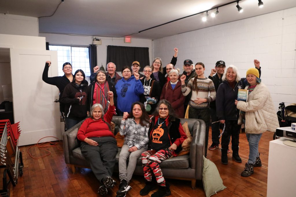 Red Deer Billie Pierre and April Thomas pose with supporters during a fundraising event at the Vines Art Society centre in ‘Vancouver’ on Feb. 7. Photo by Aaron Hemens