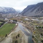 nməlqytkʷ (The Similkameen River) flowing through the Town of Keremeos in smǝlqmíx homelands in 2024. Photo by Aaron Hemens