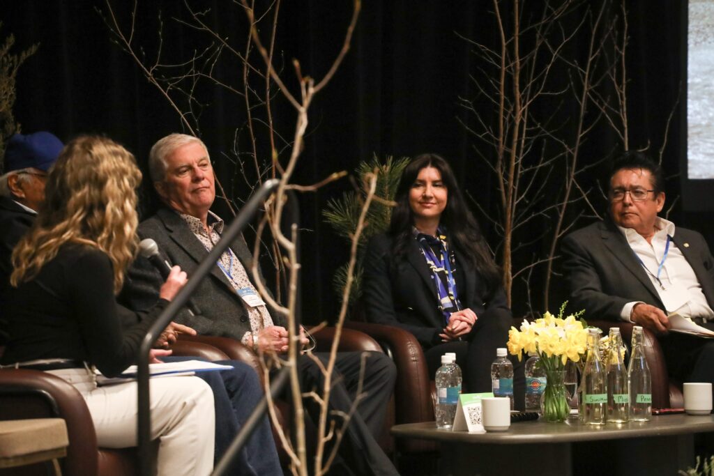 Members of the Okanagan-Similkameen Collaborative Leadership Table host a panel discussion at the Okanagan Nation Alliance's 2026 siwɬkʷ (Water) and Climate Forum on March 23 in Kelowna, B.C. From left to right: Tricia Brett, leadership table co-chair and councillor for the District of Lake Country; sil-teekin Greg Gabriel, chief of Penticton Indian Band; Julius Bloomfield, mayor of Penticton; Amanda Shatzko, director of Regional District North Okanagan; and simo Robert Louie, leadership table co-chair and chief of Westbank First Nation. Photo by Aaron Hemens